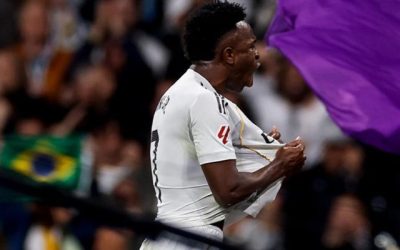 Vinicius Jr celebrando su doblete en el derbi